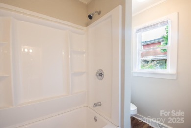 Updated water view home with a full basement, located less than on Piney Point Golf Club in North Carolina - for sale on GolfHomes.com, golf home, golf lot