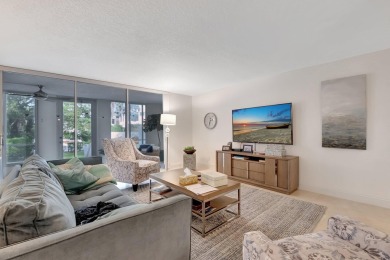 Enjoy the Florida lifestyle in this gorgeous 1st-floor condo in on Boca Grove Golf and Tennis in Florida - for sale on GolfHomes.com, golf home, golf lot