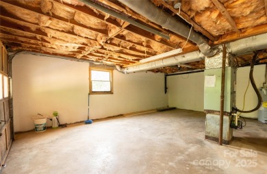 Updated water view home with a full basement, located less than on Piney Point Golf Club in North Carolina - for sale on GolfHomes.com, golf home, golf lot