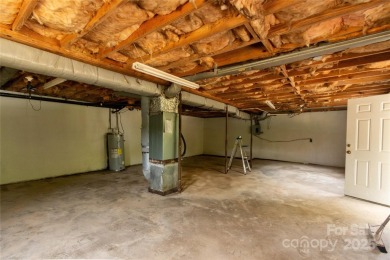 Updated water view home with a full basement, located less than on Piney Point Golf Club in North Carolina - for sale on GolfHomes.com, golf home, golf lot