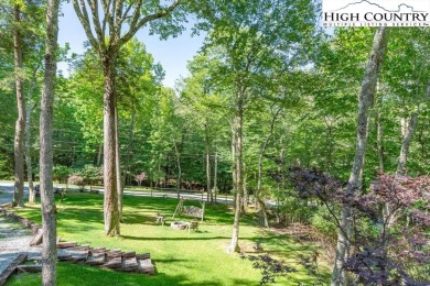 Charming, serene mountain home on Beech mountain with a LEVEL on Beech Mountain Club in North Carolina - for sale on GolfHomes.com, golf home, golf lot
