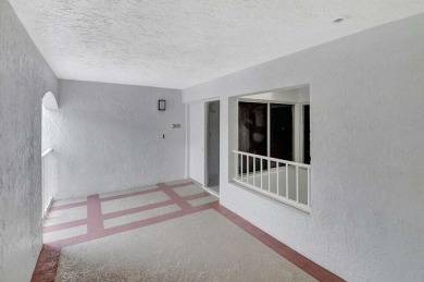 Enjoy the Florida lifestyle in this gorgeous 3rd-floor condo in on Boca Grove Golf and Tennis in Florida - for sale on GolfHomes.com, golf home, golf lot