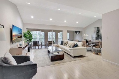 Enjoy the Florida lifestyle in this gorgeous 3rd-floor condo in on Boca Grove Golf and Tennis in Florida - for sale on GolfHomes.com, golf home, golf lot