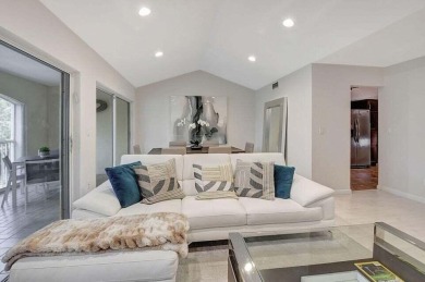 Enjoy the Florida lifestyle in this gorgeous 3rd-floor condo in on Boca Grove Golf and Tennis in Florida - for sale on GolfHomes.com, golf home, golf lot