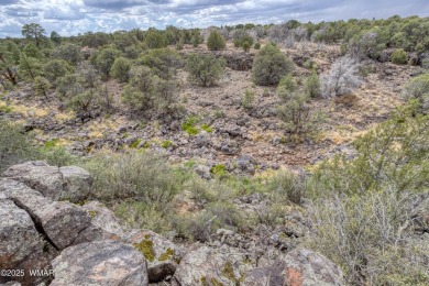 This exceptional 25,265 sq ft mountain parcel in White Mountain on Silver Creek Golf Club in Arizona - for sale on GolfHomes.com, golf home, golf lot
