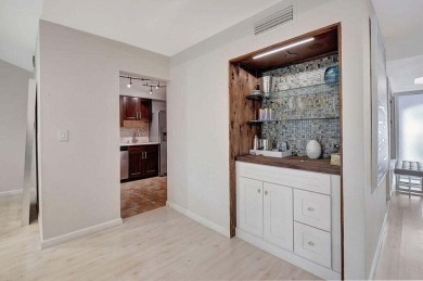 Enjoy the Florida lifestyle in this gorgeous 3rd-floor condo in on Boca Grove Golf and Tennis in Florida - for sale on GolfHomes.com, golf home, golf lot