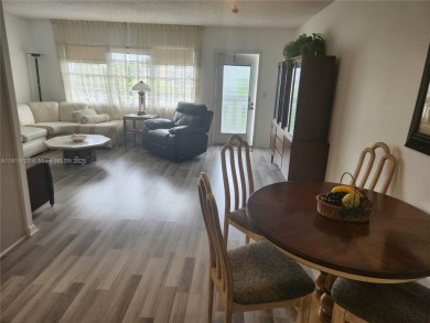 Don't miss this opportunity! Impeccably maintained 1 bedroom, 1 on Hillsboro Pines Golf in Florida - for sale on GolfHomes.com, golf home, golf lot