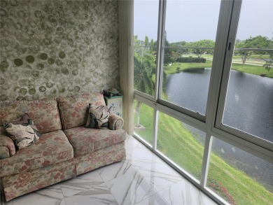 Don't miss this opportunity! Impeccably maintained 1 bedroom, 1 on Hillsboro Pines Golf in Florida - for sale on GolfHomes.com, golf home, golf lot