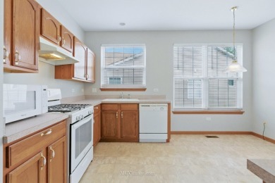 Beautiful, move-in ready RANCH home is nestled on one of the on Carillon Lakes 3 Hole Course in Illinois - for sale on GolfHomes.com, golf home, golf lot