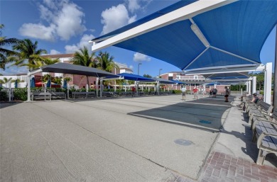 Don't miss this opportunity! Impeccably maintained 1 bedroom, 1 on Hillsboro Pines Golf in Florida - for sale on GolfHomes.com, golf home, golf lot