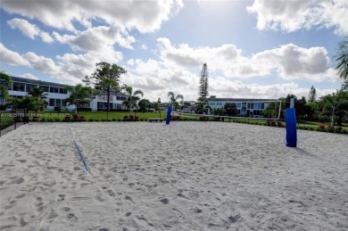 Don't miss this opportunity! Impeccably maintained 1 bedroom, 1 on Hillsboro Pines Golf in Florida - for sale on GolfHomes.com, golf home, golf lot