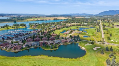 Nestled across from the 8th fairway of Eagle Bend Osprey golf on Eagle Bend Golf Course in Montana - for sale on GolfHomes.com, golf home, golf lot