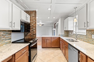 ONE TO SEE! STYLISH WELL MAINTAINED, FRESHLY PAINTED, ALL BRICK on Fort Walton Beach Golf Course in Florida - for sale on GolfHomes.com, golf home, golf lot