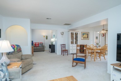 Wake up to peaceful lake views and vibrant sunsets at 565 Jones on London Bridge Golf Course in Arizona - for sale on GolfHomes.com, golf home, golf lot