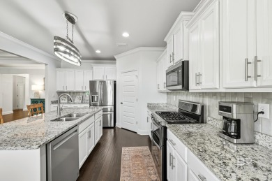 Situated on a desirable corner lot in Craft Farms North, this on Craft Farms - Cypress Bend in Alabama - for sale on GolfHomes.com, golf home, golf lot