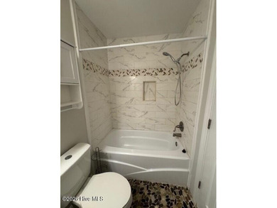 You won't want to miss this beautiful end-unit, single-level on River Bend Golf and Country Club in North Carolina - for sale on GolfHomes.com, golf home, golf lot