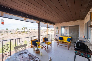 Wake up to peaceful lake views and vibrant sunsets at 565 Jones on London Bridge Golf Course in Arizona - for sale on GolfHomes.com, golf home, golf lot