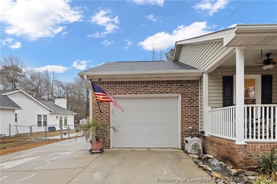 Welcome to this charming 3-bedroom, 2-bath home located in Hope on Hope Mills Golf and Country Club in North Carolina - for sale on GolfHomes.com, golf home, golf lot