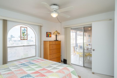 Wake up to peaceful lake views and vibrant sunsets at 565 Jones on London Bridge Golf Course in Arizona - for sale on GolfHomes.com, golf home, golf lot