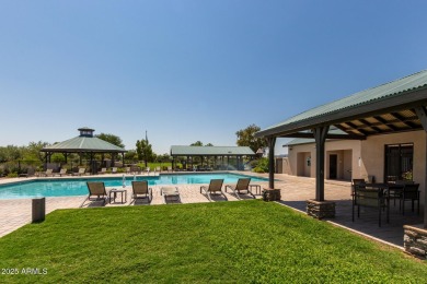 Welcome to this charming single-level home located in the highly on The Golf Club At Johnson Ranch in Arizona - for sale on GolfHomes.com, golf home, golf lot