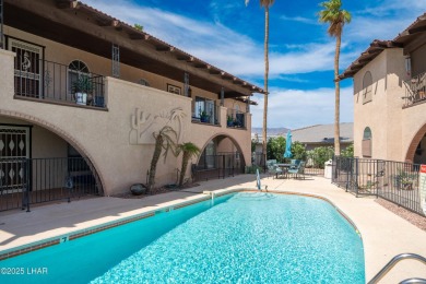Wake up to peaceful lake views and vibrant sunsets at 565 Jones on London Bridge Golf Course in Arizona - for sale on GolfHomes.com, golf home, golf lot