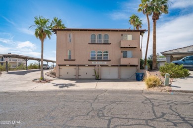 Wake up to peaceful lake views and vibrant sunsets at 565 Jones on London Bridge Golf Course in Arizona - for sale on GolfHomes.com, golf home, golf lot