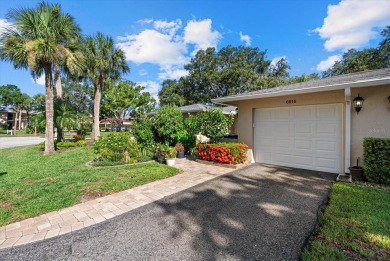 This beautifully renovated villa on a desirable corner lot in on Palm Aire Country Club of Sarasota in Florida - for sale on GolfHomes.com, golf home, golf lot