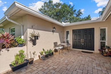 This beautifully renovated villa on a desirable corner lot in on Palm Aire Country Club of Sarasota in Florida - for sale on GolfHomes.com, golf home, golf lot
