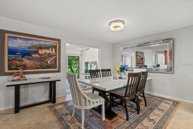 This beautifully renovated villa on a desirable corner lot in on Palm Aire Country Club of Sarasota in Florida - for sale on GolfHomes.com, golf home, golf lot