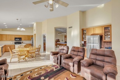 Welcome to your new home, where you can relax on your patio and on Western Skies Golf Club in Arizona - for sale on GolfHomes.com, golf home, golf lot