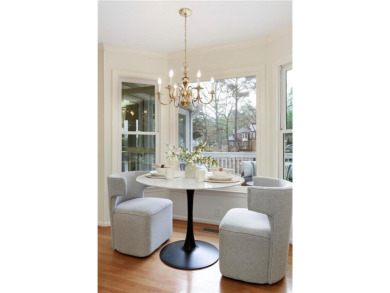 Nestled in the charming Spinnakers of Windward, an intimate on The Golf Club of Georgia in Georgia - for sale on GolfHomes.com, golf home, golf lot
