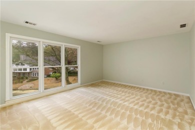 Nestled in the charming Spinnakers of Windward, an intimate on The Golf Club of Georgia in Georgia - for sale on GolfHomes.com, golf home, golf lot