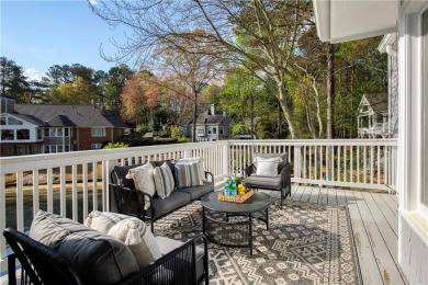 Nestled in the charming Spinnakers of Windward, an intimate on The Golf Club of Georgia in Georgia - for sale on GolfHomes.com, golf home, golf lot