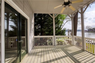 Nestled in the charming Spinnakers of Windward, an intimate on The Golf Club of Georgia in Georgia - for sale on GolfHomes.com, golf home, golf lot