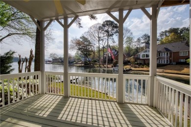 Nestled in the charming Spinnakers of Windward, an intimate on The Golf Club of Georgia in Georgia - for sale on GolfHomes.com, golf home, golf lot