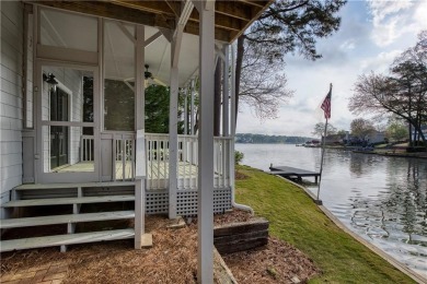 Nestled in the charming Spinnakers of Windward, an intimate on The Golf Club of Georgia in Georgia - for sale on GolfHomes.com, golf home, golf lot
