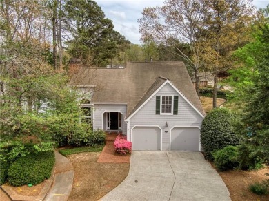 Nestled in the charming Spinnakers of Windward, an intimate on The Golf Club of Georgia in Georgia - for sale on GolfHomes.com, golf home, golf lot