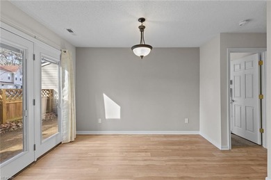 Welcome home to this inviting 2-bedroom, 2-bath condo in the on Kiln Creek Golf and Country Club in Virginia - for sale on GolfHomes.com, golf home, golf lot