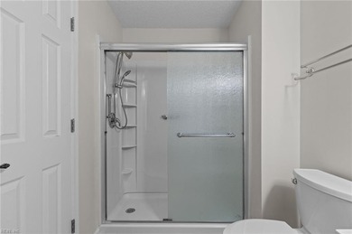 Welcome home to this inviting 2-bedroom, 2-bath condo in the on Kiln Creek Golf and Country Club in Virginia - for sale on GolfHomes.com, golf home, golf lot