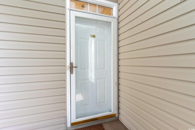 This is a serene and sun-filled 3-bedroom/3-bathroom end-unit on The Valley At Eastport in South Carolina - for sale on GolfHomes.com, golf home, golf lot