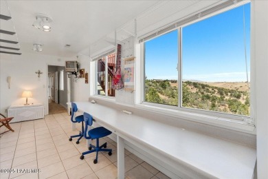 This spacious 5-bedroom, 3-bath home on 1.4 acres in Prescott on Prescott Golf and Country Club in Arizona - for sale on GolfHomes.com, golf home, golf lot