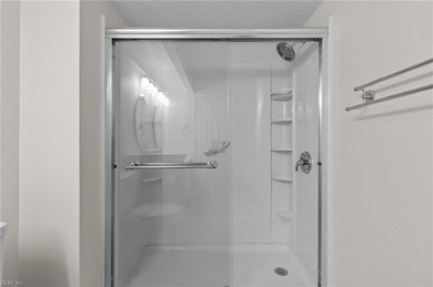 Welcome home to this inviting 2-bedroom, 2-bath condo in the on Kiln Creek Golf and Country Club in Virginia - for sale on GolfHomes.com, golf home, golf lot