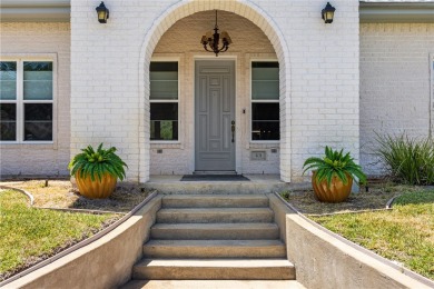 Experience coastal elegance at 101 Bay Hills, in Rockport. This on Rockport Country Club in Texas - for sale on GolfHomes.com, golf home, golf lot