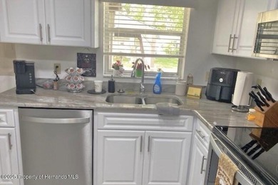 Step into this move-in ready, turnkey home in Timber Pines, a on Timber Pines Golf Course in Florida - for sale on GolfHomes.com, golf home, golf lot