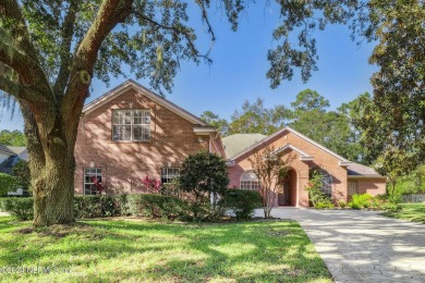 Step into luxury at this beautifully updated brick Pool home on Jacksonville Golf and Country Club in Florida - for sale on GolfHomes.com, golf home, golf lot