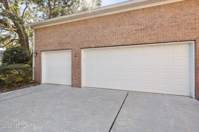 Step into luxury at this beautifully updated brick Pool home on Jacksonville Golf and Country Club in Florida - for sale on GolfHomes.com, golf home, golf lot