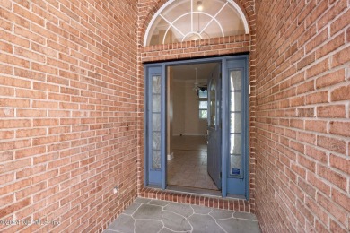 Step into luxury at this beautifully updated brick Pool home on Jacksonville Golf and Country Club in Florida - for sale on GolfHomes.com, golf home, golf lot