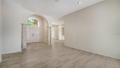 One or more photo(s) has been virtually staged. Behind the gates on TPC Prestancia in Florida - for sale on GolfHomes.com, golf home, golf lot