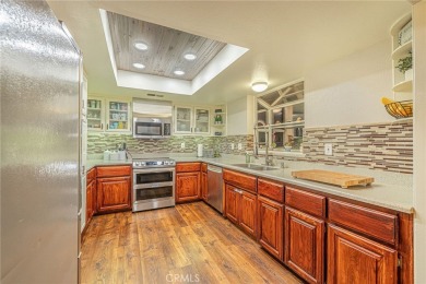 Discover the perfect mix of comfort and country charm in this on Lake Elizabeth Golf and Ranch Club in California - for sale on GolfHomes.com, golf home, golf lot