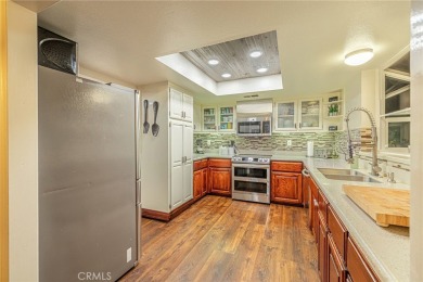 Discover the perfect mix of comfort and country charm in this on Lake Elizabeth Golf and Ranch Club in California - for sale on GolfHomes.com, golf home, golf lot